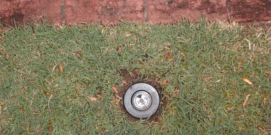 Lawn Sprinkler Positioned Away From Pathway Lawn Sprinkler Positioned Away From Pathway